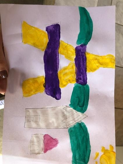 Imagem representando um desenho de uma criança feito em uma atividade de oficina artística com o autxílio do projeto de extensão